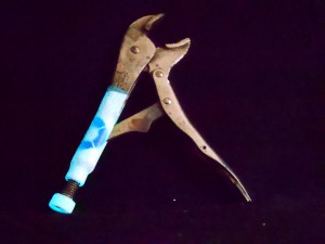 Primed and pained handle to a Vice Grip that's been dipped in glow-in-the-dark Plasti Dip